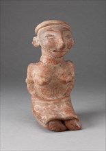 Seated Female Figurine with Patterned Skirt, 100 B.C./A.D. 300.