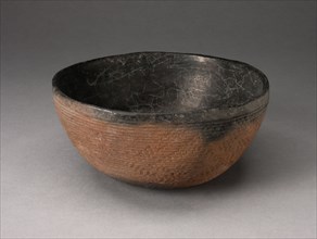 Bowl with Textured Surface Decoration in Basketry-Like Pattern, A.D. 900/1000. Round, red-brown bowl with small cracks its black interior. The outer surface is striated with tight horizontal lines and...