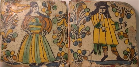 Polychrome Tiles Depicting Male and Female Figures in Contemporary Dress Surrounded by Abstract Foliage, 1700/1750.