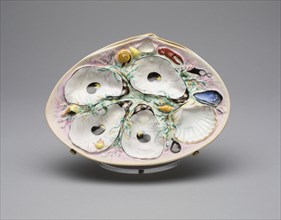 Oyster Plate, c. 1881. Porcelain with relief decoration of oysters.