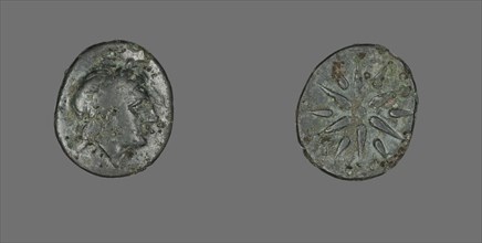 Coin Depicting the God Apollo, 4th century BCE.