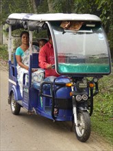 Tuk Tuk school transport in India, 2019.