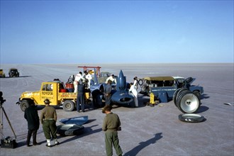Mechanics fuelling Bluebird CN7 for World Land Speed Record attempt, Lake Eyre, 1964. Creator: Unknown.