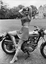 Monty Python actress Carol Cleveland on Triumph Bandit motorcycle, 1971. Creator: Unknown.