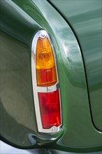 Left tail lights of a 1961 Aston Martin DB4 GT previously owned by Donald Campbell. Creator: Unknown.