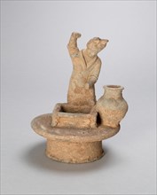 Woman Standing Over a Well, Northern Wei Dynasty (386-535), early 6th cent; with later restorations. Creator: Unknown.