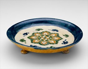 Footed Dish with Lotus Medallion and Cloud Scrolls, Tang dynasty...first half of 8th century. Creator: Unknown.