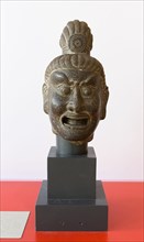 Head of a Guardian King, n.d., style of Tang dynasty (618-907). Creator: Unknown.