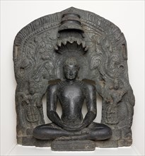 Jaina Tirthankara Parshvanatha with Serpent Hood Seated in Meditation..., 12th century. Creator: Unknown.