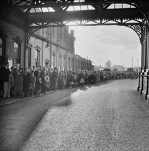 Bournemouth train station during an outing of Laing's London office to Bournemouth, Hampshire, 1953. Creator: John Laing plc.