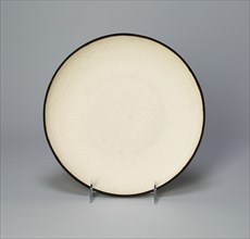 Dish with with Lotus, Saggataria, Mallow, and Peony, Northern Song dynasty (960-1127)/Jin dynasty (1115-1234), early 12th century.