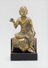 Dicang (Khsitigarbha), or "He Who Encompasses the Earth," Seated and Holding a Wish-Bearing Jewel (Cintamani), Tang dynasty (618-907), c. 8th century.