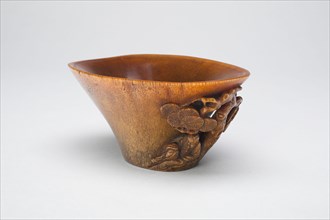 Cup with Handle in the Form of a Scholar Seated Beneath a Pine Tree, Late Ming (1368-1644) or early Qing dynasty (1644-1911), 17th/18th century.