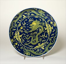 Blue-Ground Yellow-Enameled 'Dragon' Dish, Qing dynasty (1644-1911), Qianlong reign mark and period (1736-1795).