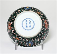 Small Saucer with Red, Blue, Green, Yellow Scroll of Camellias, Qing dynasty (1644-1911), Yongzheng reign mark and period (1723-1735).