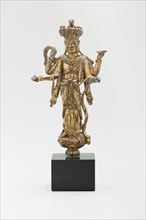 Eleven-Headed and Six-Armed Guanyin (Avalokiteshvara) Standing on a Lotus, Tang dynasty (618-907), c. 9th century.