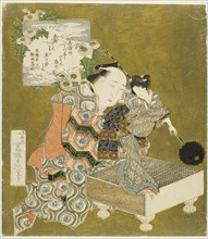 Puppeteer holding puppet on "go" board, Japan, 1820s.
