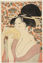Woman Holding a Tortoise-shell Hair-comb, Japan, c. 1795/96.
