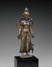 Sarasvati, Goddess of Wisdom, Holding a Book and a Water Pot, 10th century.