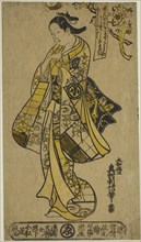 The Actor Arashi Wakano as a woman standing beneath a cherry tree, c. 1724.