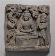 Buddha Worshipped by the Gods Indra and Brahma, Kushan period, 1st/2nd century. Ancient region of Gandhara (modern Pakistan).