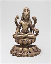 Four-Armed Bodhisattva Avalokiteshvara Seated in Lotus Position (Padmasana), 8th/9th century. Khyber Pakhtunkhwa Province, Swat Valley (modern Pakistan).