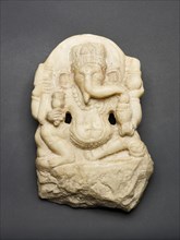 Four-Armed Seated God Ganesha, Shahi period, 7th/8th century. Made in Afghanistan, or what is now Pakistan.