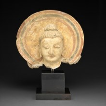 Head of Buddha, 3rd/4th century. Ancient region of Gandhara (modern Afghanistan or Pakistan).