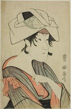Nakayama Tomisaburo Dressed as a Woman Wearing a Towel on Her Head, c. 1795.