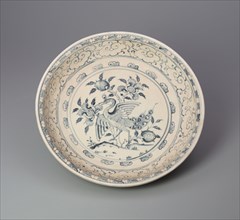 Dish with Peacock and Floral Motif, 15th century.