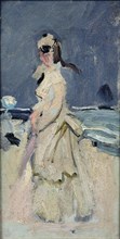 Camille on the beach, 1870. Creator: Monet, Claude (1840-1926).