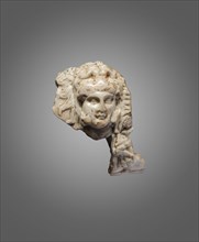 Head of Alexander as Herakles. From the Oxus Temple, Takht-i Sangin, Third cent. BC. Creator: Central Asian Art.