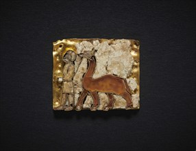 Votive plaque in cloisonné with man leading a camel. From the Oxus Temple..., 6th-5th cent. BC. Creator: Central Asian Art.