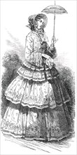 Paris Fashions for August - Promenade Dress, 1850. Creator: Unknown.