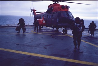 Helicopter on an aircraft carrier, Falklands War, 1982. Creator: Luis Rosendo.