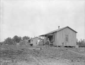 New cabins at Hill House, Mississippi, 1936. Creator: Dorothea Lange.