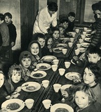 'School Dinner for Evacuated Children', 1943. Creator: Unknown.