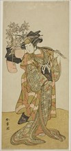 The Actor Yamashita Kinsaku II as Odai, an Eboshi (Hat) Seller, in the Play Hana-zumo..., c. 1775. Creator: Shunsho.