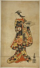 The Actor Sanjo Kantaro II as Oshichi in the play "Nanakusa Fukki Soga," performed at the, 1718. Creator: Torii Kiyonobu I.