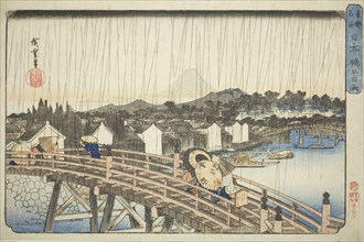 Rain at Nihonbashi Bridge (Nihonbashi no hakuu), from the series "Famous Places in the..., c1832/38. Creator: Ando Hiroshige.