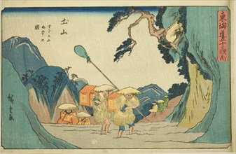 Tsuchiyama: Suzuka Mountains in the Rain (Tsuchiyama, Suzukayama uchu no zu), from t..., c. 1841/44. Creator: Ando Hiroshige.