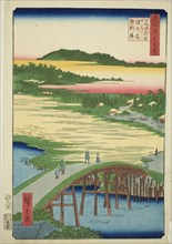 Sugatami Bridge, Omokage Bridge and the Gravel Pit at Takata (Takata Sugataminohashi Omoka..., 1857. Creator: Ando Hiroshige.