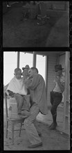 Community barber shop in Kern County migrant camp, California, 1936. Creator: Dorothea Lange.