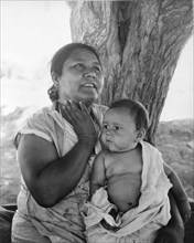 Mexican mother in California, 1935. Creator: Dorothea Lange.