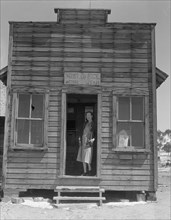 Post office and postmistress, view number two, Widtsoe, Utah, 1936. Creator: Dorothea Lange.