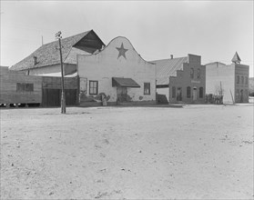 The movie theatre of Escalante, Utah, 1936. Creator: Dorothea Lange.