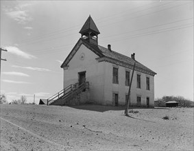 The church in the center of town (Mormon), Escalante, Utah, 1936. Creator: Dorothea Lange.