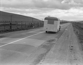 Note on "mobile housing" - Car and homemade trailer on U.S. 101 near King City, 1936. Creator: Dorothea Lange.