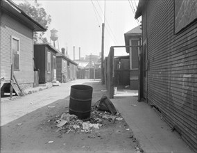 Mexican quarter of Los Angeles, one quarter mile from City Hall, California, 1936. Creator: Dorothea Lange.