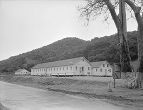 Dining hall, kitchen and hospital, Hot Springs federal shelter, California, 1936. Creator: Dorothea Lange.